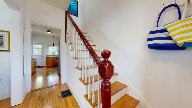 25 Nevens St Unit 1, Portland, ME 04103 - staircase with hardwood / wood-style flooring
