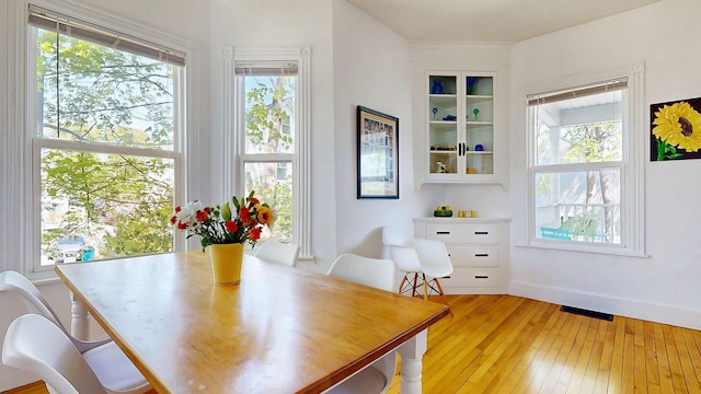 25 Nevens St Unit 1, Portland, ME 04103 - dining space featuring light wood-style floors and baseboards