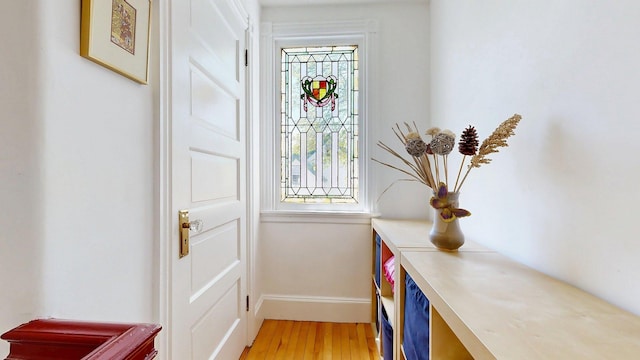 25 Nevens St Unit 1, Portland, ME 04103 - doorway featuring light wood-style flooring and baseboards