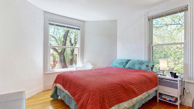 25 Nevens St Unit 1, Portland, ME 04103 - bedroom featuring wood finished floors and baseboards