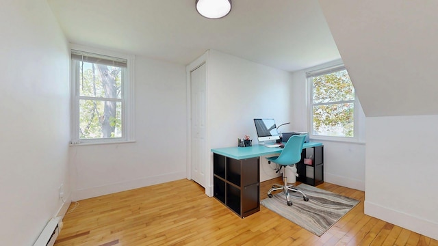 25 Nevens St Unit 1, Portland, ME 04103 - office space featuring plenty of natural light, light wood-style flooring, baseboards, and a baseboard heating unit