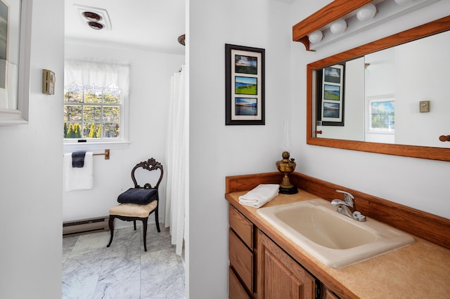bathroom with vanity, marble finish floor, curtained shower, and baseboard heating