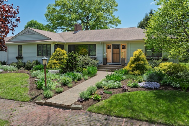69 Brookside Rd, Portland, ME 04103 - single story home featuring a chimney, a front yard, and roof with shingles