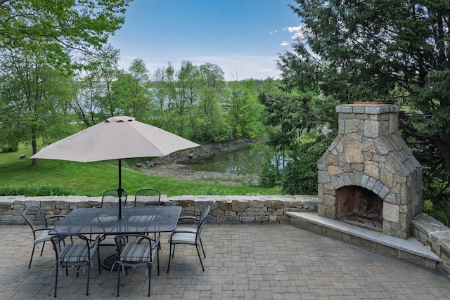 69 Brookside Rd, Portland, ME 04103 - view of patio featuring outdoor dining space and an outdoor stone fireplace