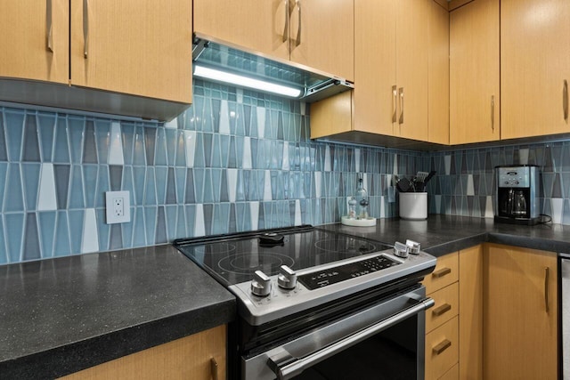 69 Brookside Rd, Portland, ME 04103 - kitchen featuring electric range oven, exhaust hood, decorative backsplash, and dark countertops