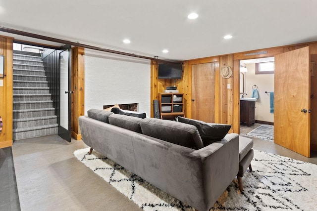 69 Brookside Rd, Portland, ME 04103 - living room featuring stairs, concrete floors, recessed lighting, and baseboards