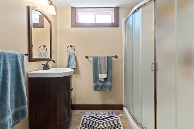 69 Brookside Rd, Portland, ME 04103 - full bath with vanity, a shower stall, and baseboards