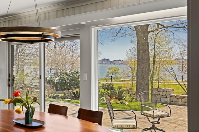 69 Brookside Rd, Portland, ME 04103 - dining space with a water view and crown molding