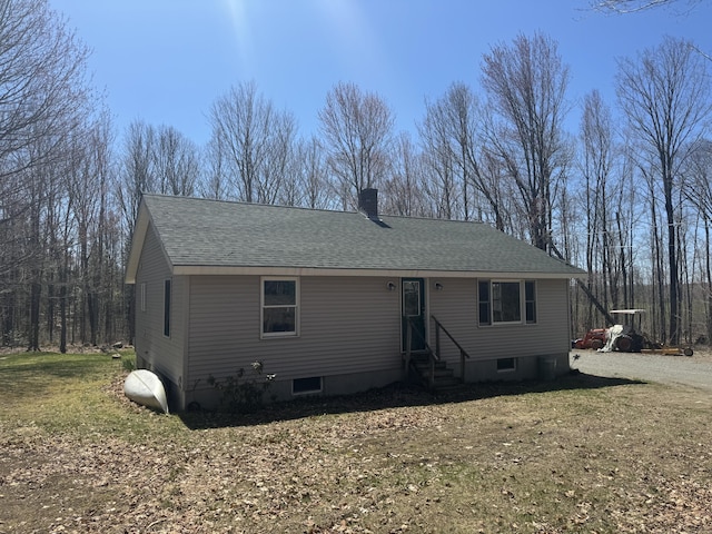 76 Norton Hill Rd, Dover-Foxcroft, ME 04426 - view of front of property featuring entry steps, a chimney, a shingled roof, and a front lawn
