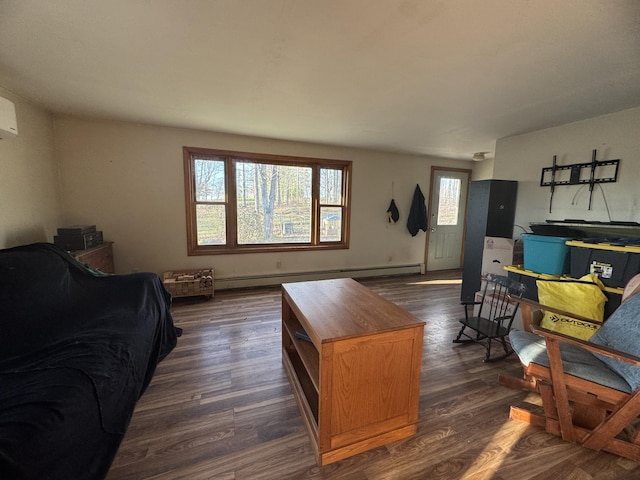76 Norton Hill Rd, Dover-Foxcroft, ME 04426 - living area featuring dark wood-style flooring and baseboard heating
