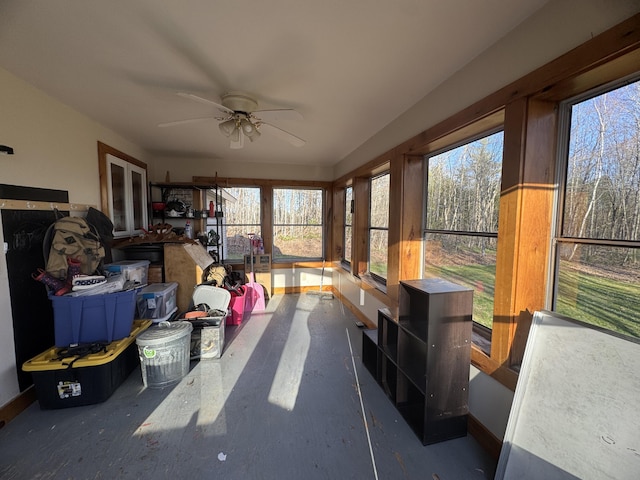 76 Norton Hill Rd, Dover-Foxcroft, ME 04426 - sunroom with concrete flooring, baseboards, and a healthy amount of sunlight