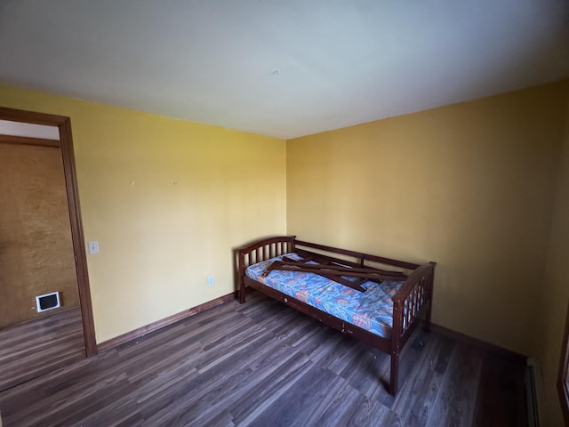 76 Norton Hill Rd, Dover-Foxcroft, ME 04426 - bedroom featuring baseboards, dark wood-style flooring, and visible vents