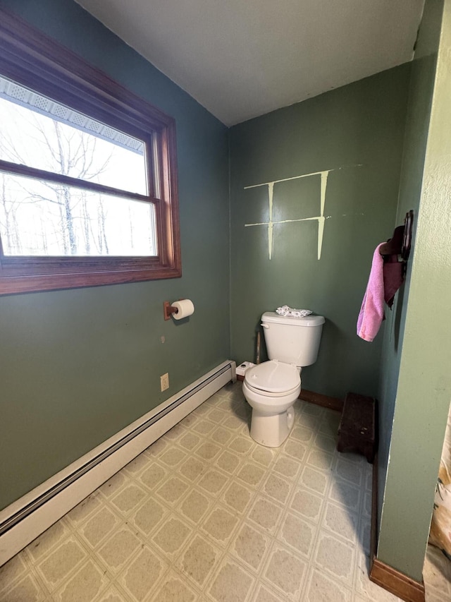 76 Norton Hill Rd, Dover-Foxcroft, ME 04426 - bathroom with tile patterned floors, a baseboard radiator, baseboards, and toilet