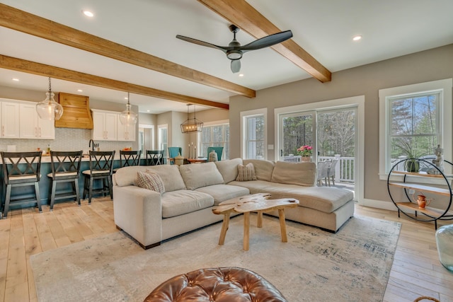 27 Oak Ridge Ter, Arundel, ME 04046 - living area with recessed lighting, light wood-style floors, beamed ceiling, and a ceiling fan
