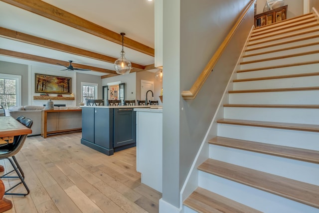 27 Oak Ridge Ter, Arundel, ME 04046 - stairs with wood-type flooring, beamed ceiling, and ceiling fan
