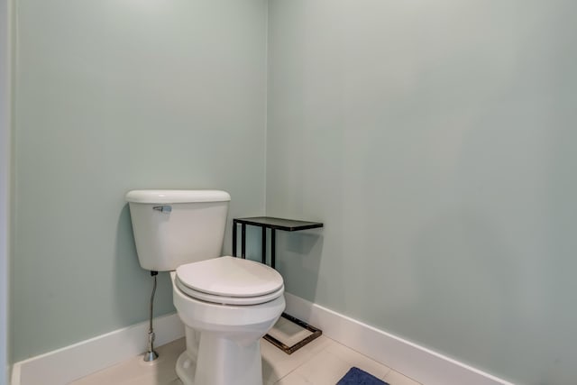 27 Oak Ridge Ter, Arundel, ME 04046 - bathroom featuring tile patterned flooring, toilet, and baseboards
