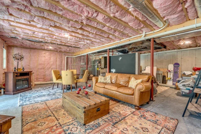 27 Oak Ridge Ter, Arundel, ME 04046 - unfinished below grade area with a glass covered fireplace and electric panel
