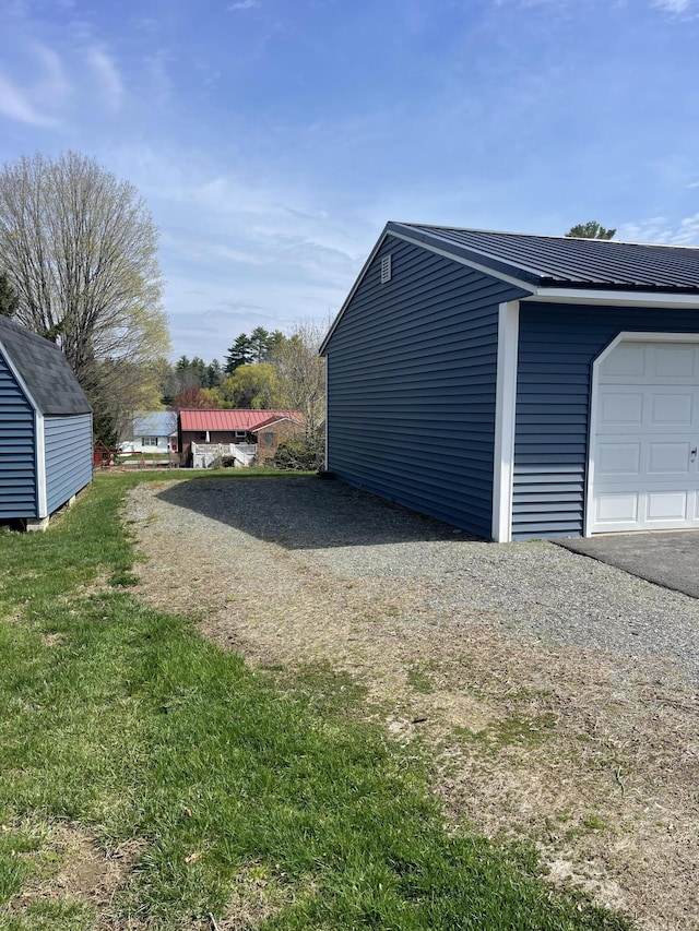 garage featuring driveway