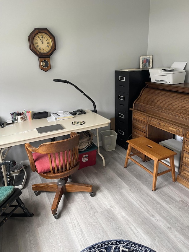 office space featuring light wood-type flooring