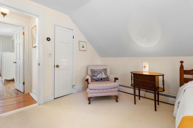 living area featuring carpet flooring, baseboard heating, and lofted ceiling