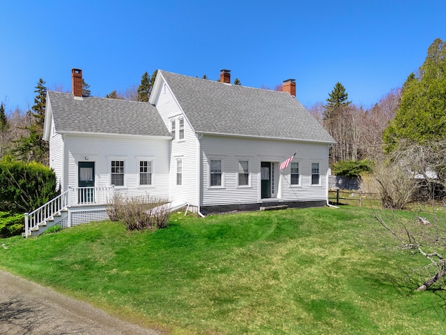 back of house with a lawn, fence, a chimney, and a shingled roof
