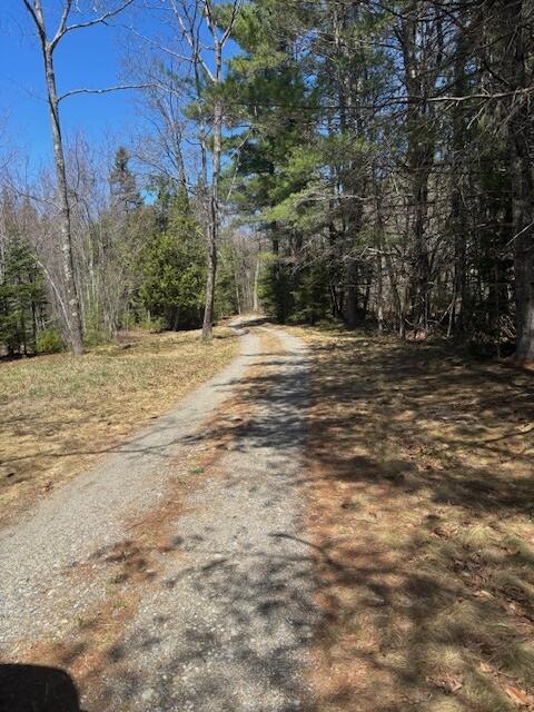 357 Leeds Rd, Wayne, ME 04284 - view of street with a forest view