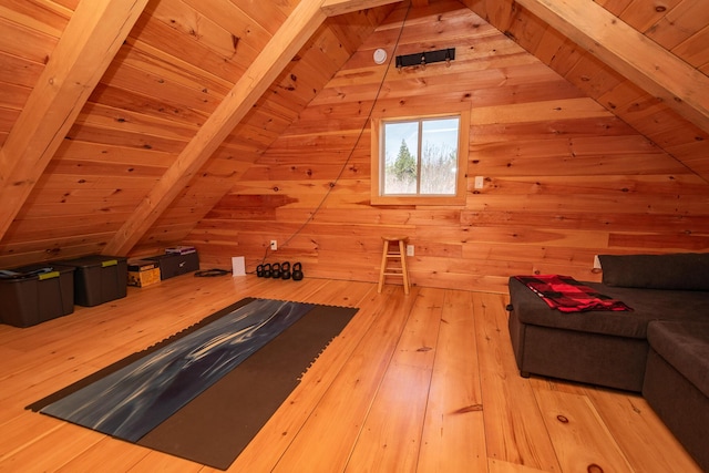 bonus room with lofted ceiling with beams and wood ceiling