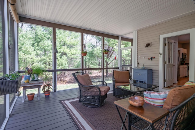 43 Sylvan Way Unit 10, Wells, ME 04090 - sunroom featuring an outdoor hangout area and plenty of natural light