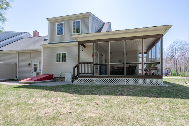 43 Sylvan Way Unit 10, Wells, ME 04090 - rear view of property featuring a sunroom and a yard