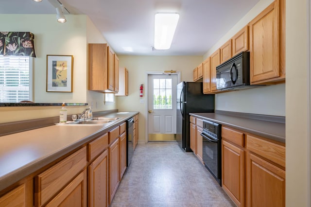 43 Sylvan Way Unit 10, Wells, ME 04090 - kitchen with black appliances, a sink, and track lighting