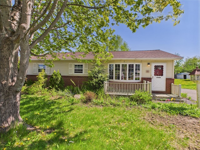 80 Garden Cir, Caribou, ME 04736 - view of front facade with brick siding