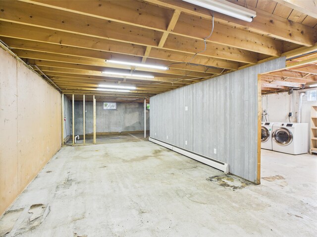 80 Garden Cir, Caribou, ME 04736 - basement featuring a baseboard heating unit and washing machine and clothes dryer