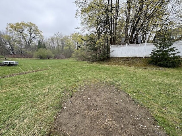view of yard with fence