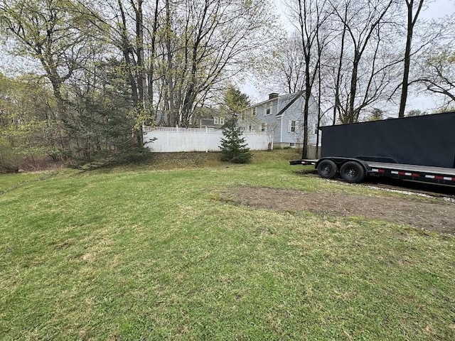 view of yard with fence