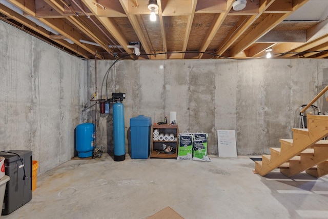 unfinished basement with stairway