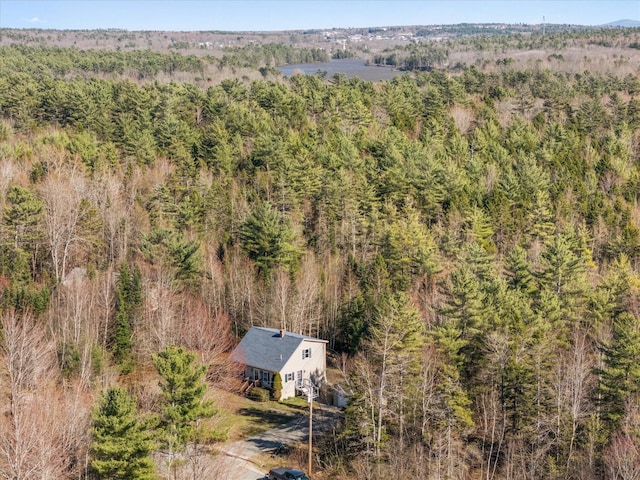 bird's eye view featuring a forest view