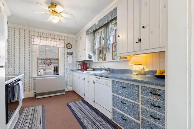 kitchen with white cabinets, ornamental molding, a sink, and dishwasher