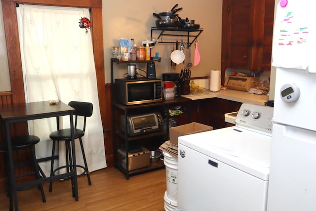 12 Sherwin St, Waterville, ME 04901 - laundry area with laundry area, light wood finished floors, and washer / clothes dryer