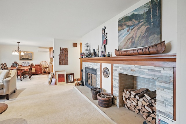 39 Turtle Run Rd Unit 8, Winthrop, ME 04364 - carpeted living area with a fireplace, a wall mounted AC, and a notable chandelier