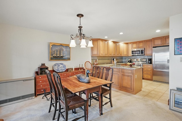 39 Turtle Run Rd Unit 8, Winthrop, ME 04364 - dining space featuring light carpet, an inviting chandelier, recessed lighting, and light tile patterned flooring
