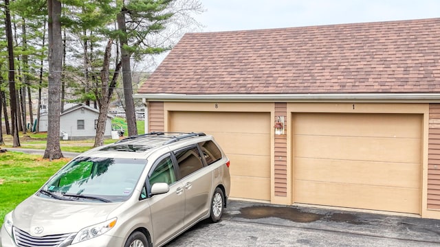 39 Turtle Run Rd Unit 8, Winthrop, ME 04364 - garage featuring driveway