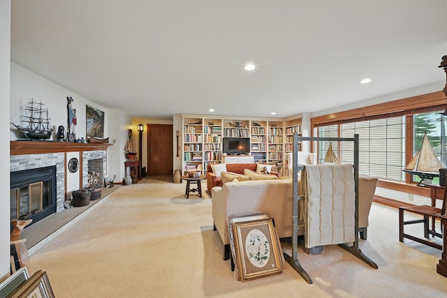 39 Turtle Run Rd Unit 8, Winthrop, ME 04364 - living area with carpet flooring, a glass covered fireplace, and recessed lighting