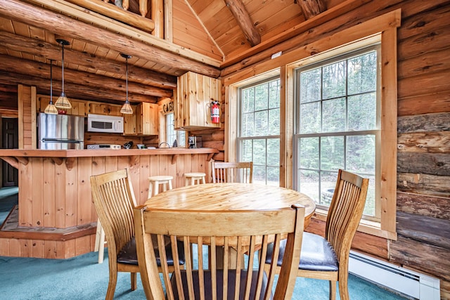 26 Mountain View Ln, Woodstock, ME 04219 - dining area featuring lofted ceiling with beams, carpet, wooden ceiling, baseboard heating, and rustic walls