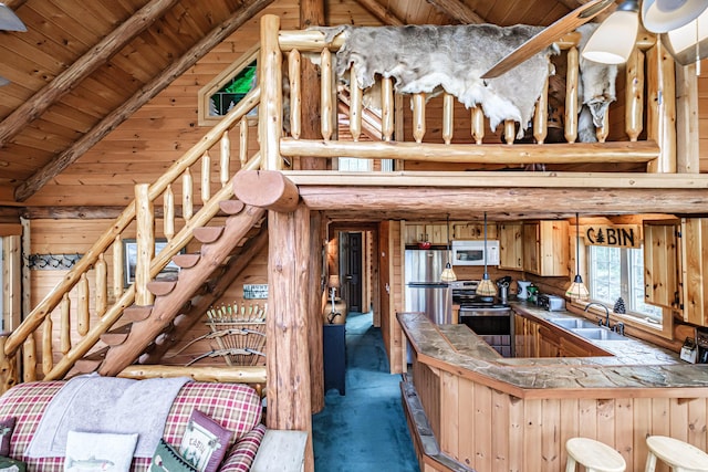 26 Mountain View Ln, Woodstock, ME 04219 - kitchen featuring wooden ceiling, a sink, a peninsula, high vaulted ceiling, and appliances with stainless steel finishes