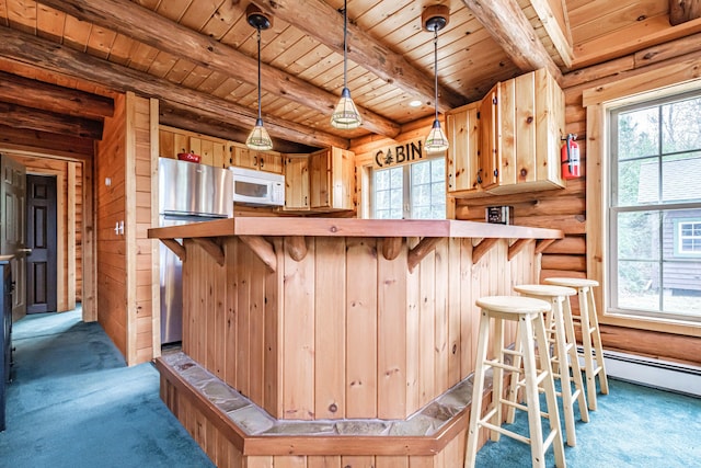 26 Mountain View Ln, Woodstock, ME 04219 - kitchen featuring freestanding refrigerator, wooden ceiling, plenty of natural light, and white microwave