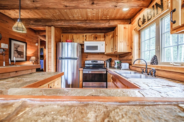 26 Mountain View Ln, Woodstock, ME 04219 - kitchen with a sink, stainless steel appliances, pendant lighting, beamed ceiling, and wood ceiling