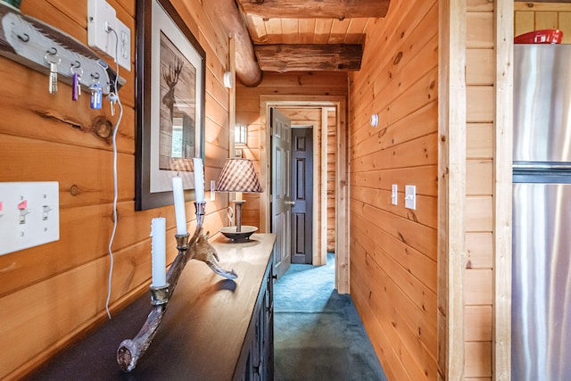 26 Mountain View Ln, Woodstock, ME 04219 - hallway with wooden walls, wood ceiling, beam ceiling, and carpet
