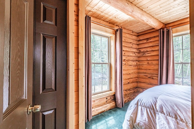 26 Mountain View Ln, Woodstock, ME 04219 - bedroom featuring wooden ceiling, rustic walls, beam ceiling, and carpet floors