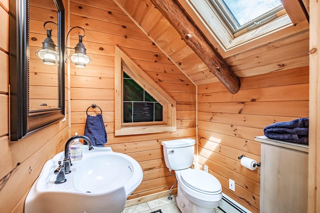 26 Mountain View Ln, Woodstock, ME 04219 - half bath with toilet, wood walls, a skylight, and a sink