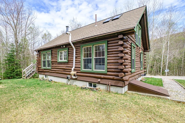 26 Mountain View Ln, Woodstock, ME 04219 - view of side of home featuring a lawn, roof with shingles, and log exterior